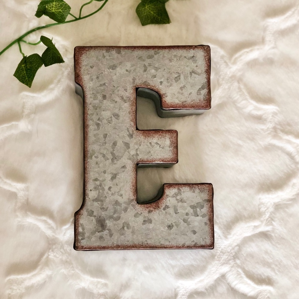 Rustic metal letter ‘E’